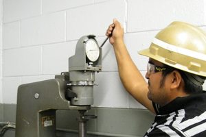 Inspector at hardness tester